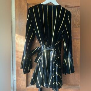 L’Academie Black and Gold Striped Wrap Dress. Size L.